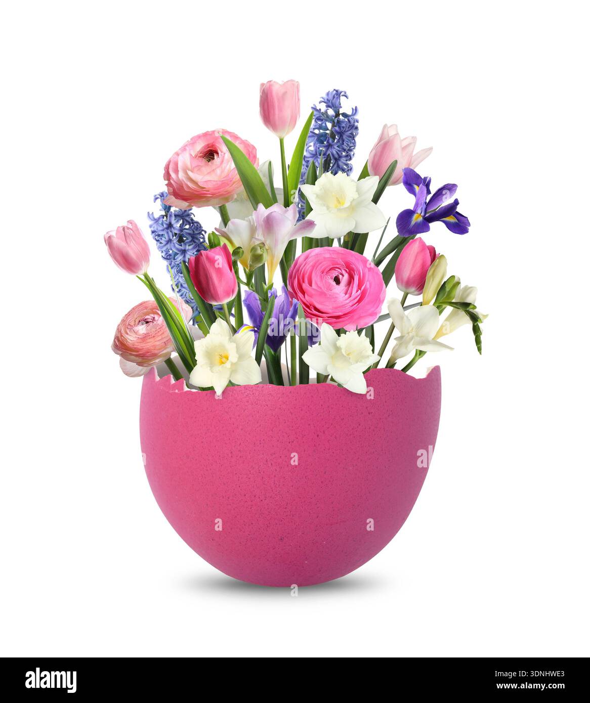 Cracked Easter eggshell with spring flowers on white background Stock Photo