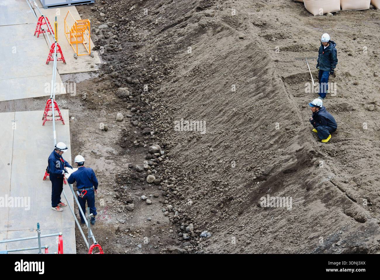 TOKYO, JAPAN - January 17, 2020: Workers on the construction site of Shibuya Sakura Stage in Shibuya. Stock Photo