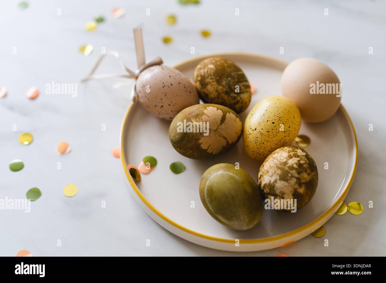 Minimalist Easter eggs dyed with natural colors. Happy Easter Day Stock Photo