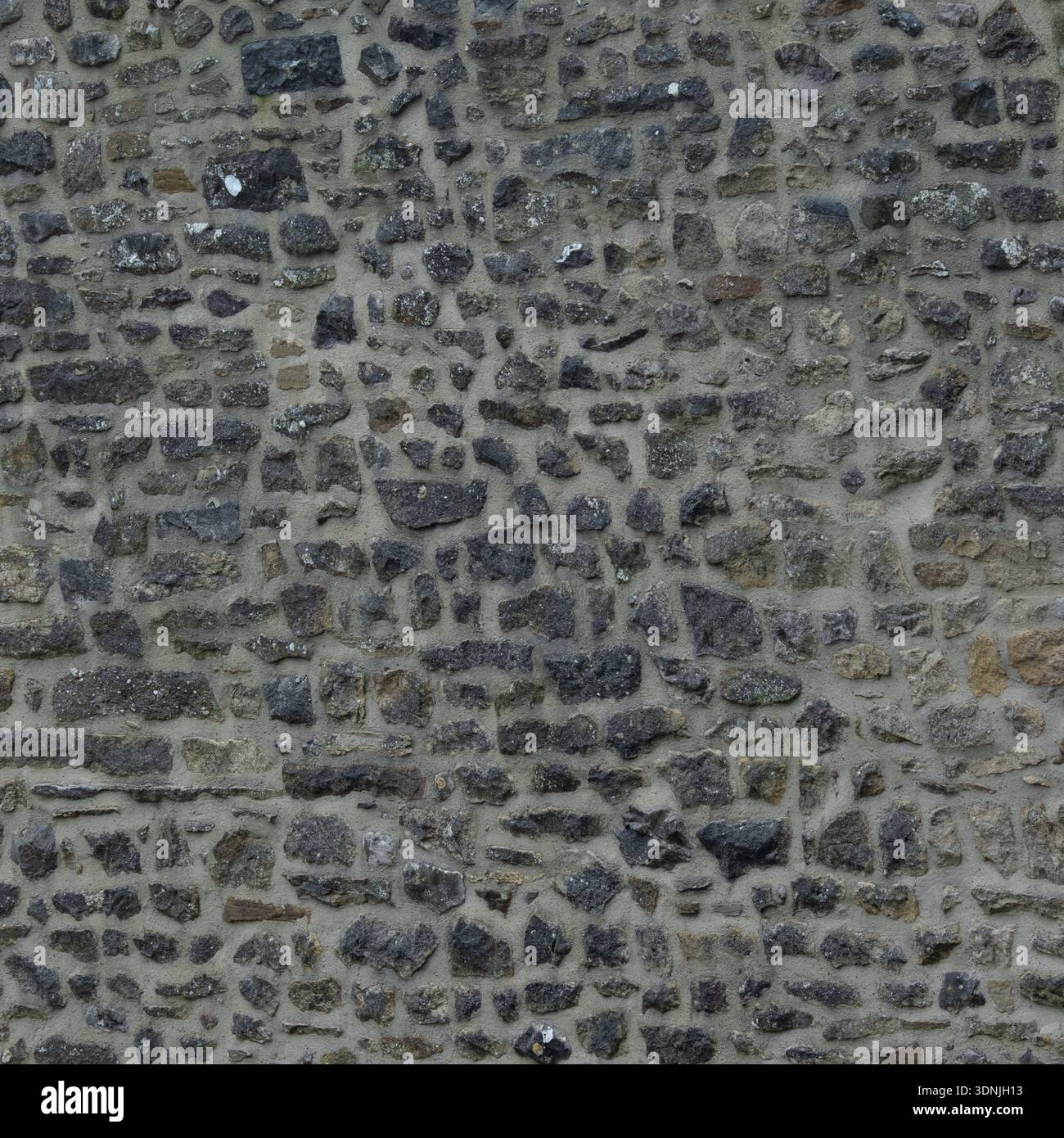 Historic Limestone with Natural Black Staining Stock Photo