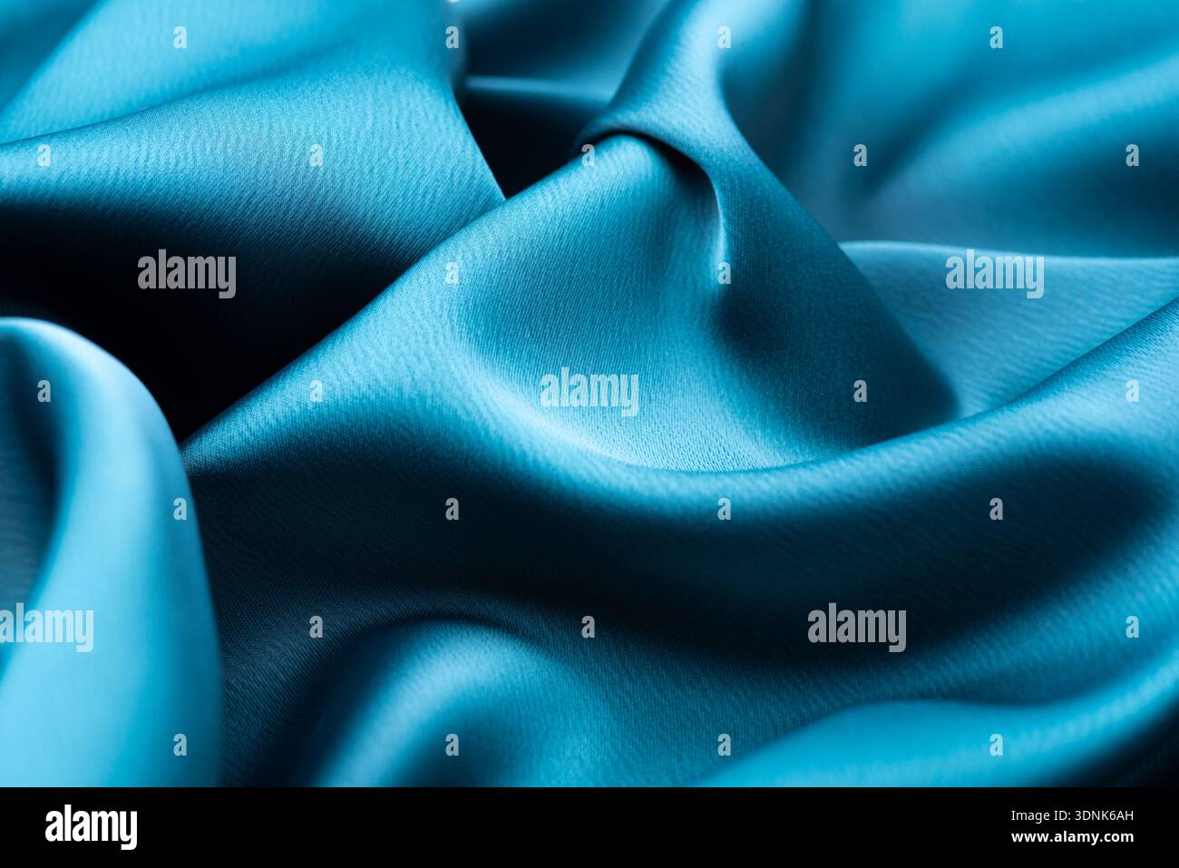 Turquoise satin texture Stock Photo