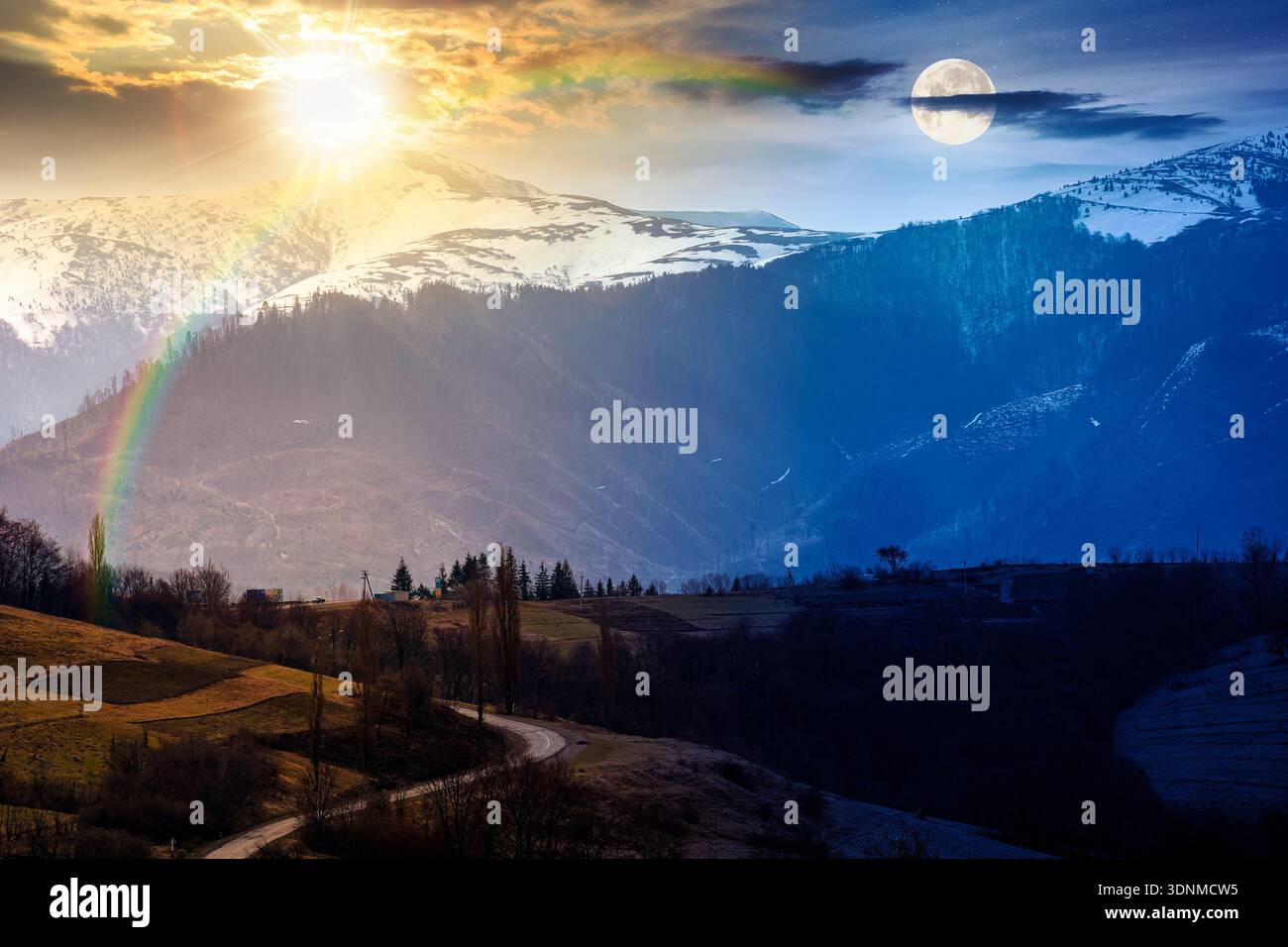 mountains on spring equinox. day and night time change concept. view of countryside landscape with rolling hills and snow covered peak with sun and mo Stock Photo