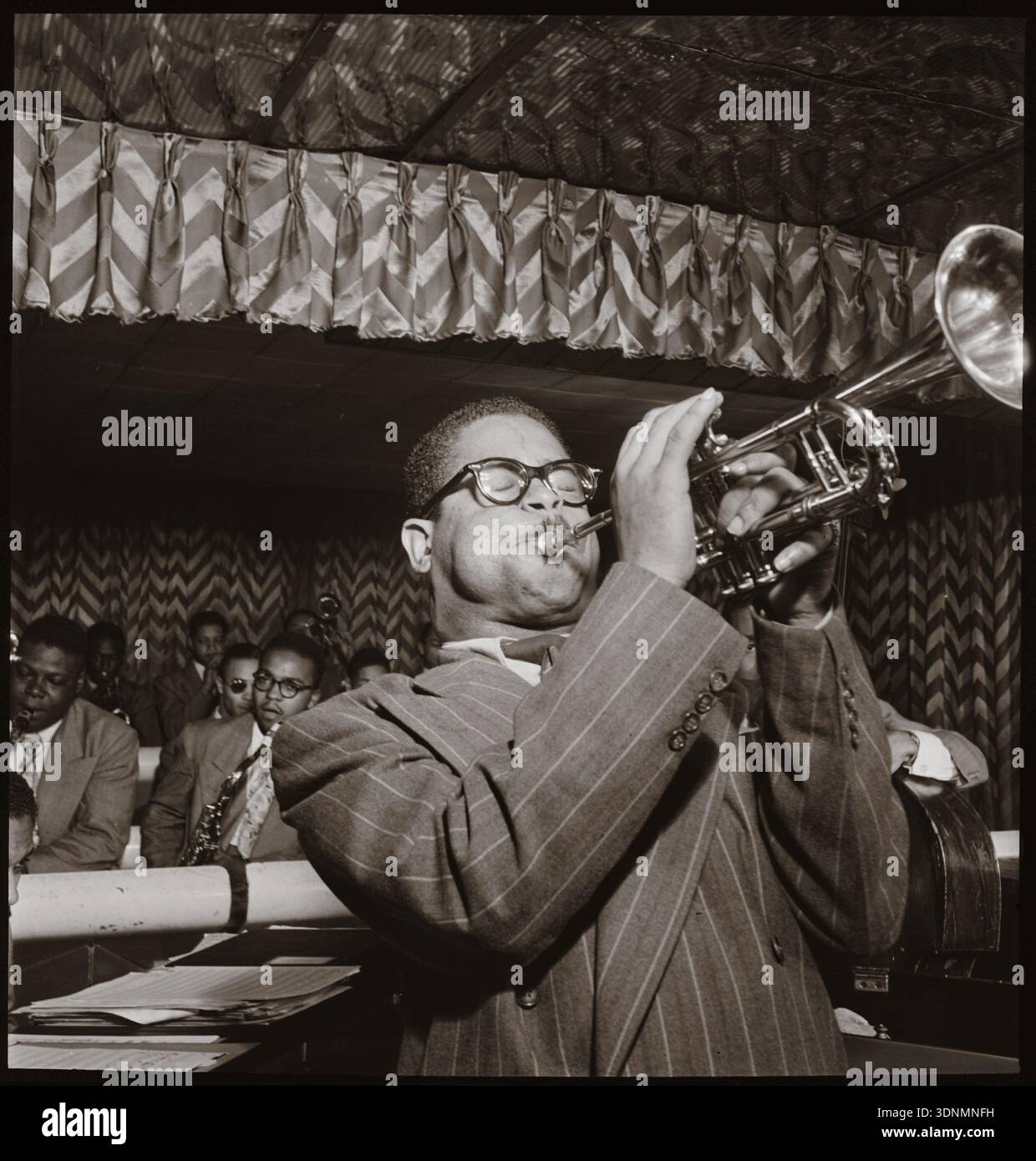 Portrait of Dizzy Gillespie, on the saxophone, Downbeat, New York
