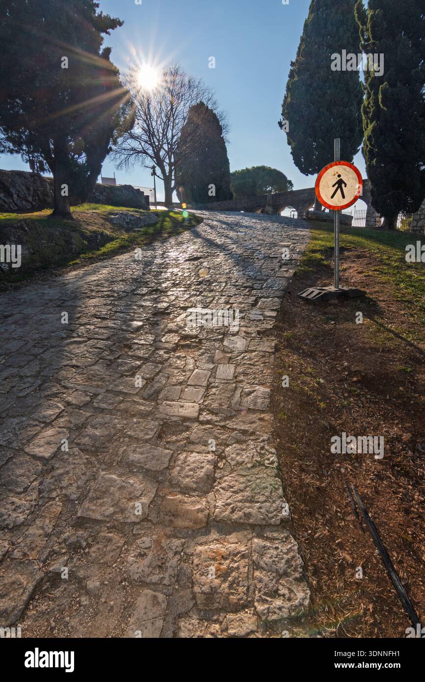 Sunlit stone path winds hi-res stock photography and images - Alamy