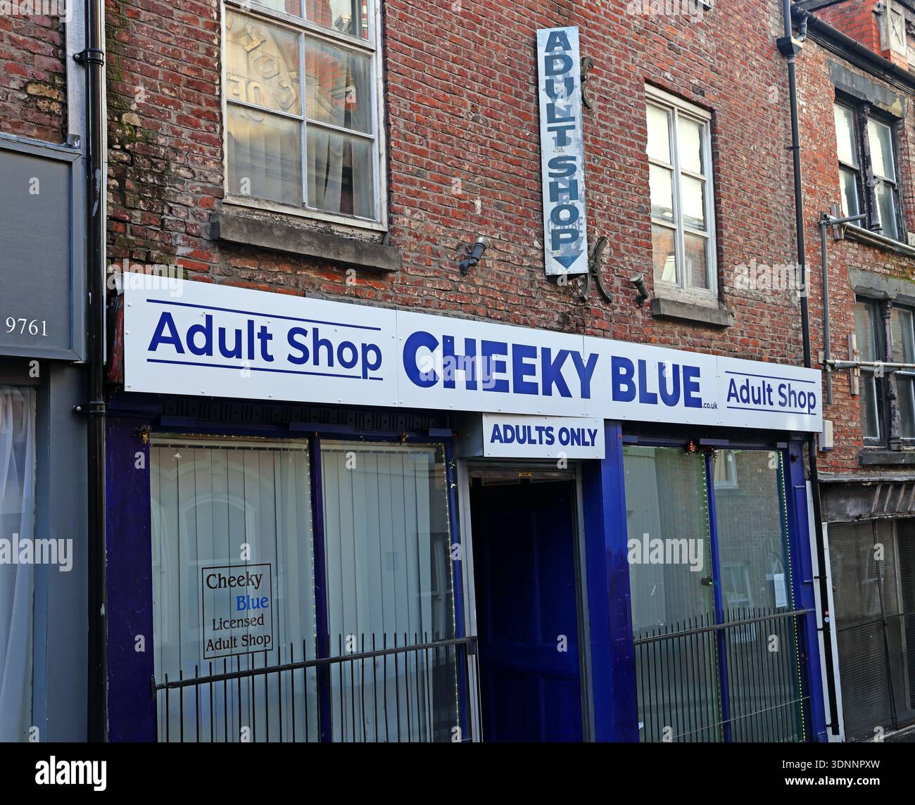 Cheeky Blue adult shop frontage in Stockport, with “Adult Shop”, “Adults Only” and “Licensed Adult Shop” signage, Greater Manchester. Stock Photo