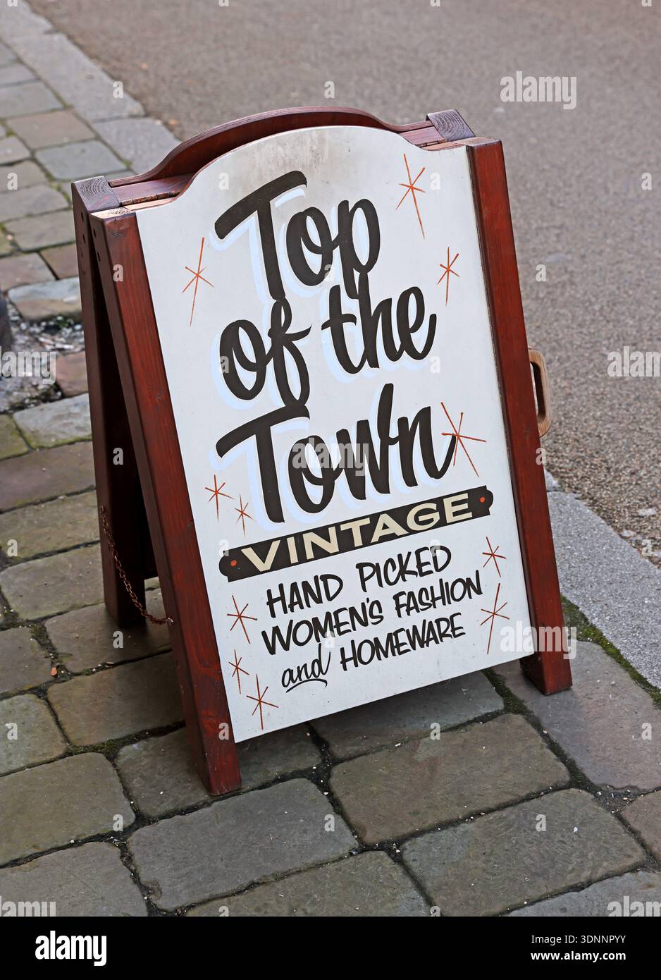 A-board sign for Top of the Town Vintage on the Underbanks, Stockport, advertising hand picked women’s fashion and homeware. Stock Photo