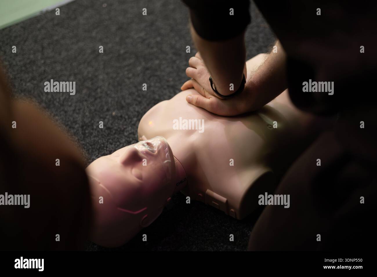 Person demonstrates cpr technique hi-res stock photography and images ...