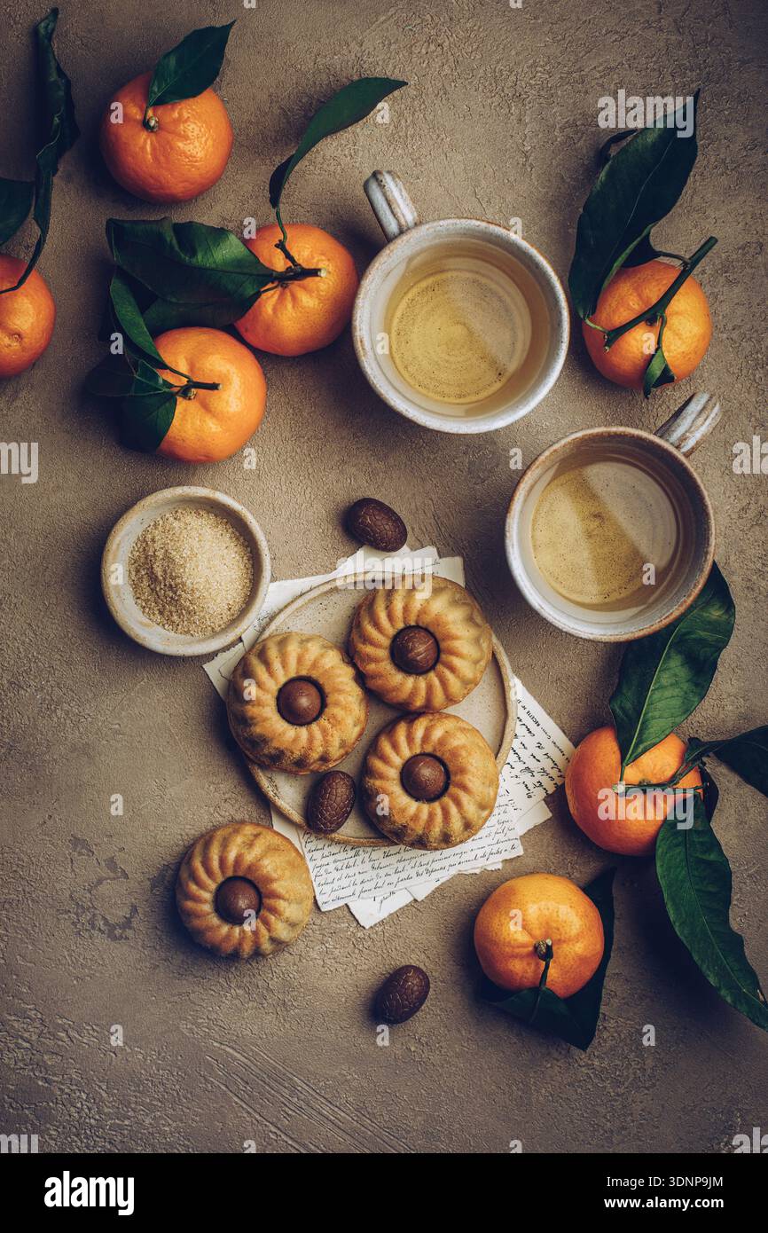 Mini bundt cakes with chocolate eggs Stock Photo