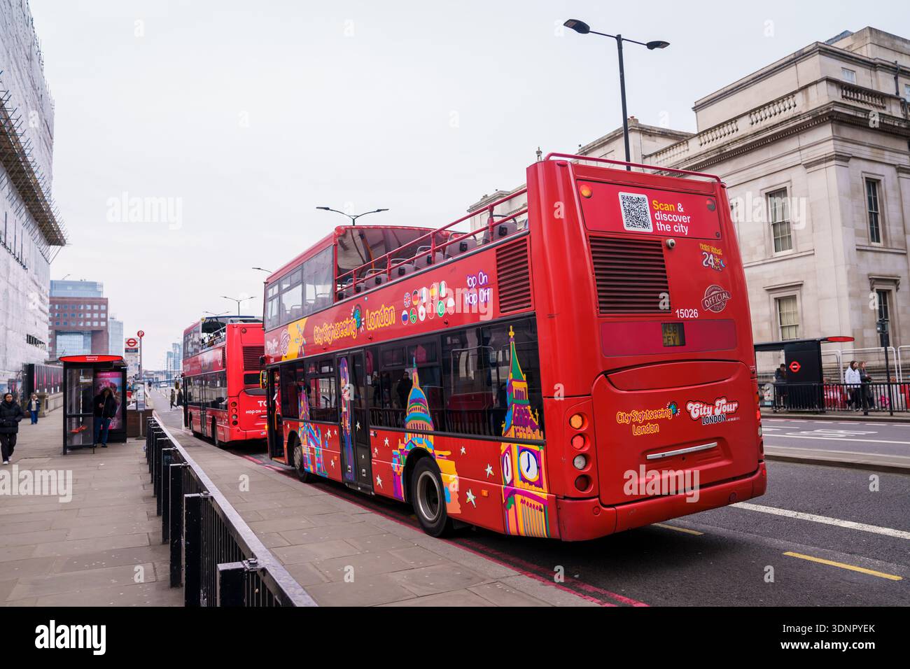 LONDON, UK. 15th  February 2025. Iconic red double-decker buses in motion on a busy street in central London. Stock Photo