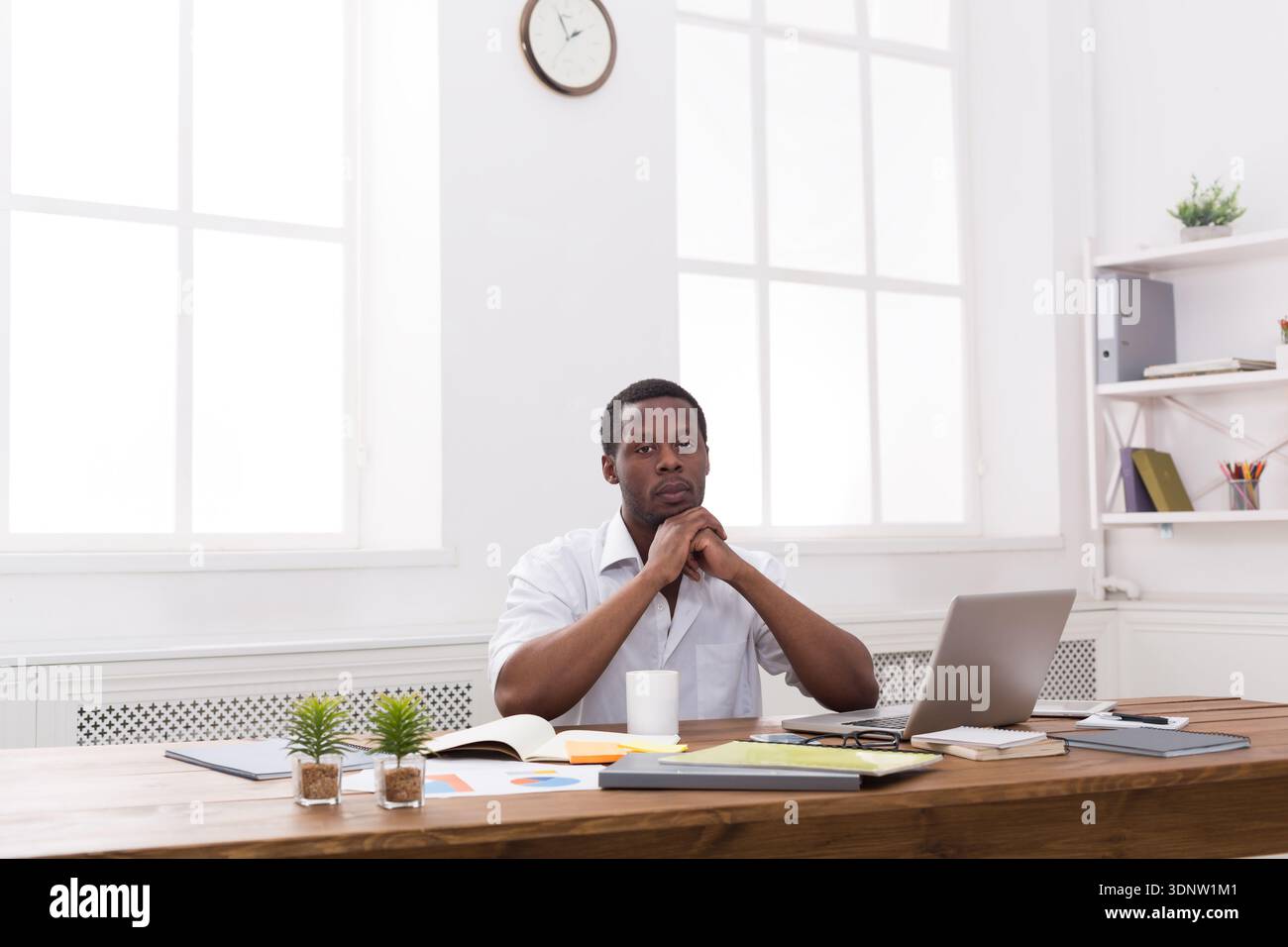 Young black man enjoying his successful business Stock Photo