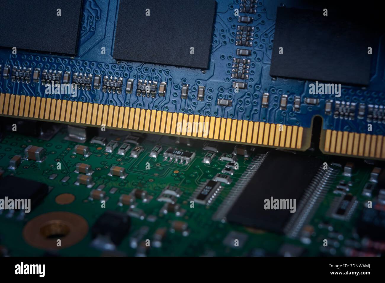 A close-up view shows a new DRAM memory module featuring DDR technology ...
