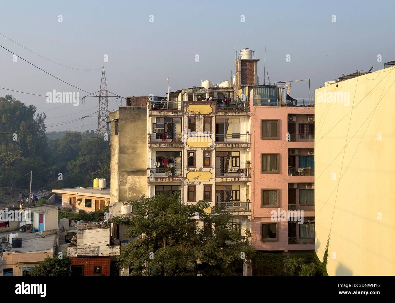 Residential apartment buildings in Jaipur, India show weathered facades ...