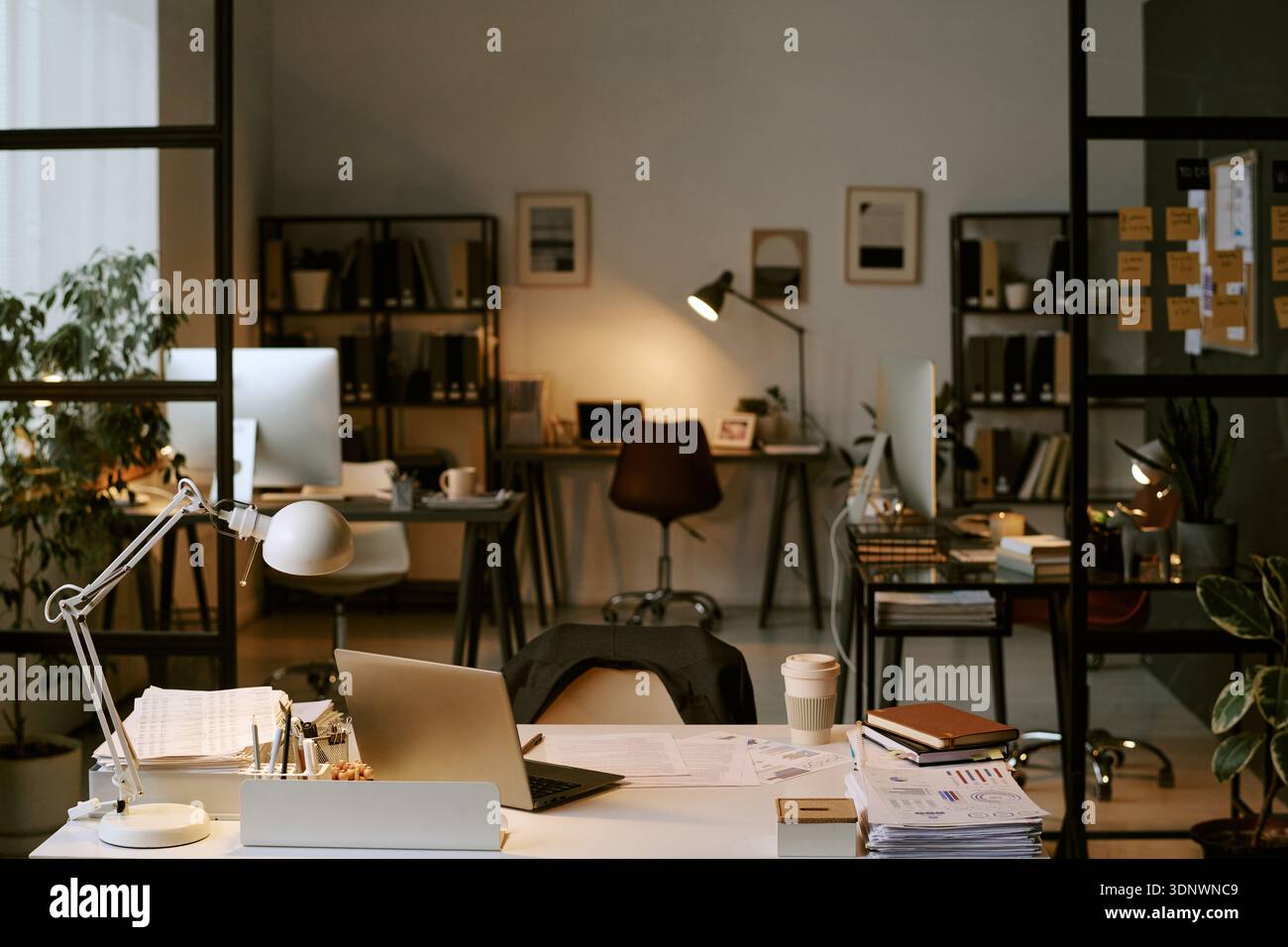 Modern Business Office Interior Featuring Empty Desks and Workstations Stock Photo