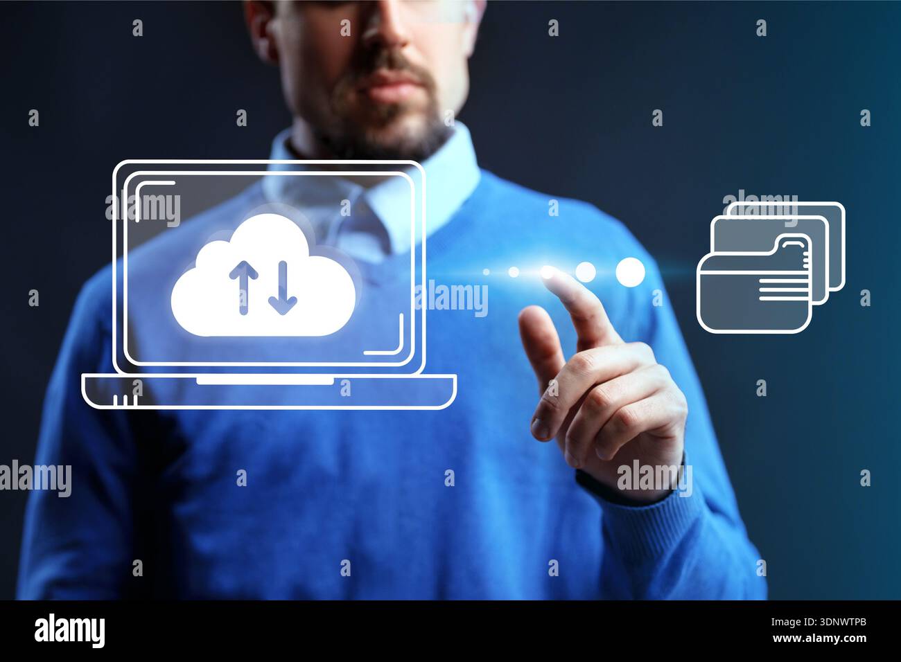 Man using technology to manage cloud services and data transfer on a laptop screen Stock Photo