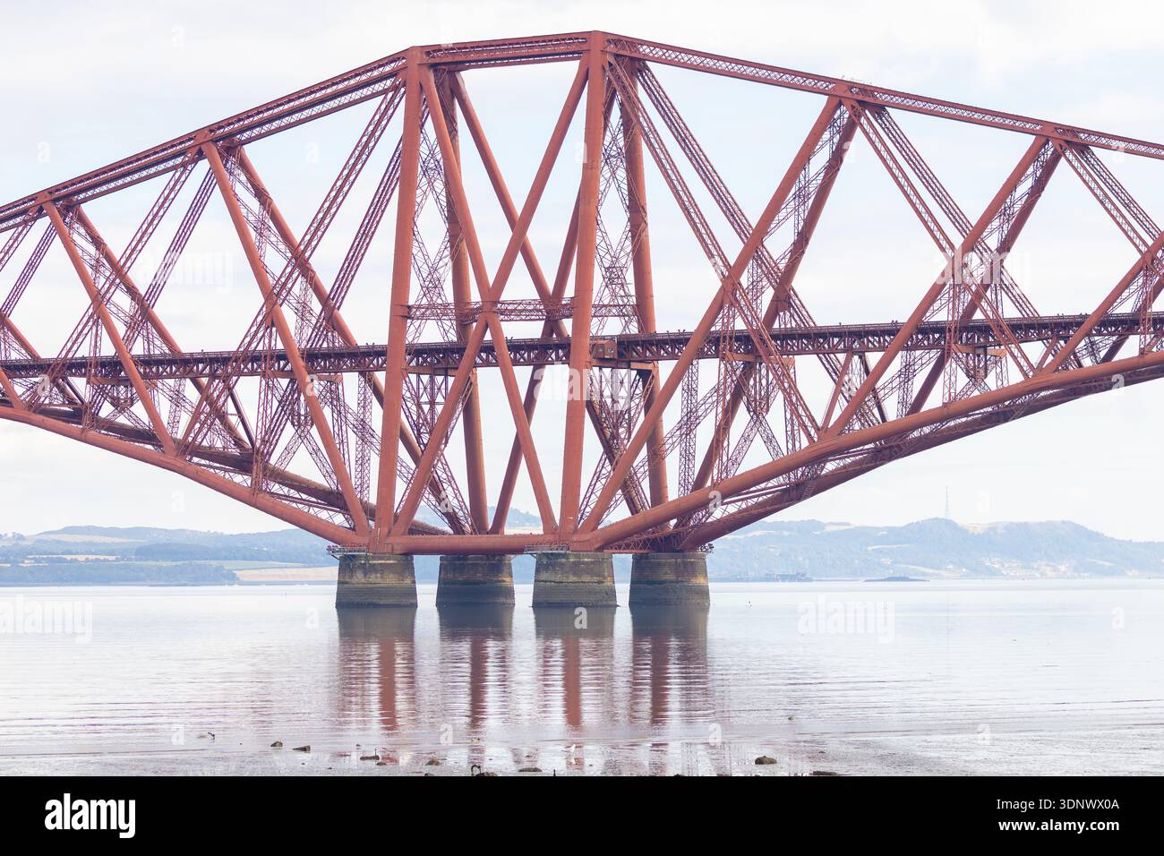 Fourth Bridge A close view of the Forth Bridge in Scotland, showing its red steel ...