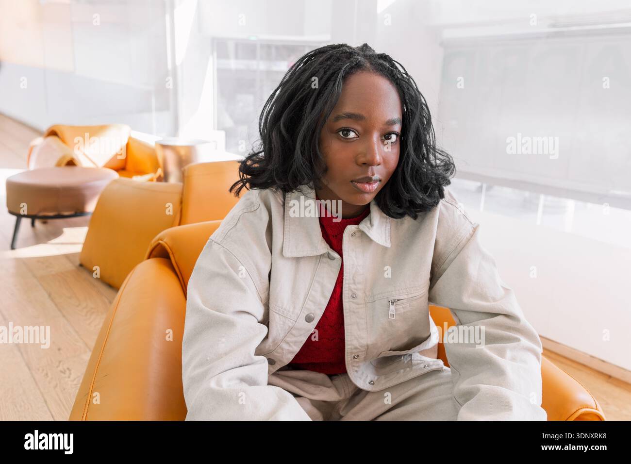 Female wearing beige top hi-res stock photography and images - Alamy