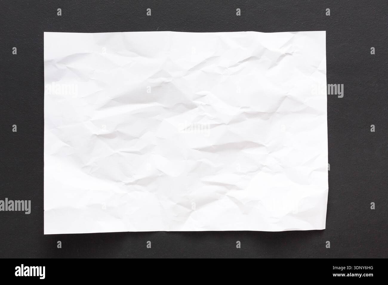 Crumpled white paper background Stock Photo