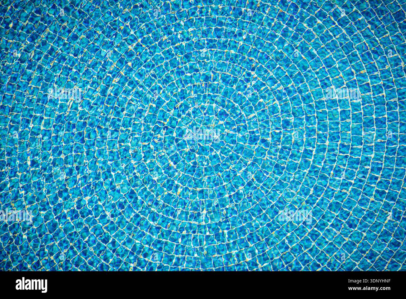 swimming pool bottom caustics ripple and flow with waves background or texture Stock Photo