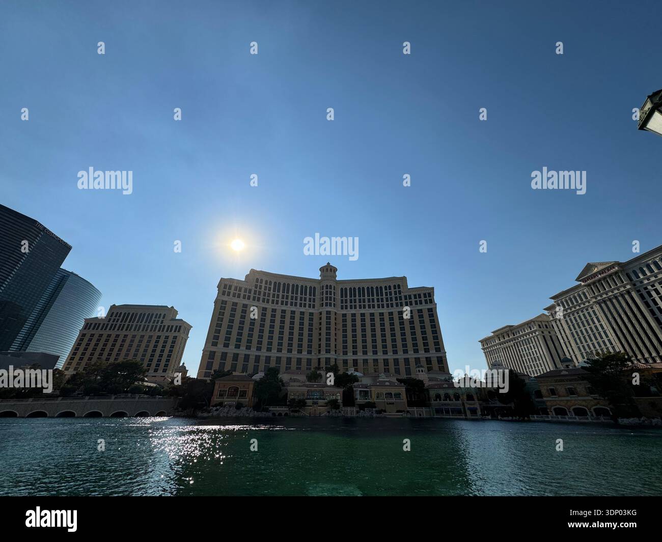 Bellagio Hotel and fountain lake on the Las Vegas Strip under bright sun, Las Vegas, Nevada, USA. - Smartphone Captured Stock Image
