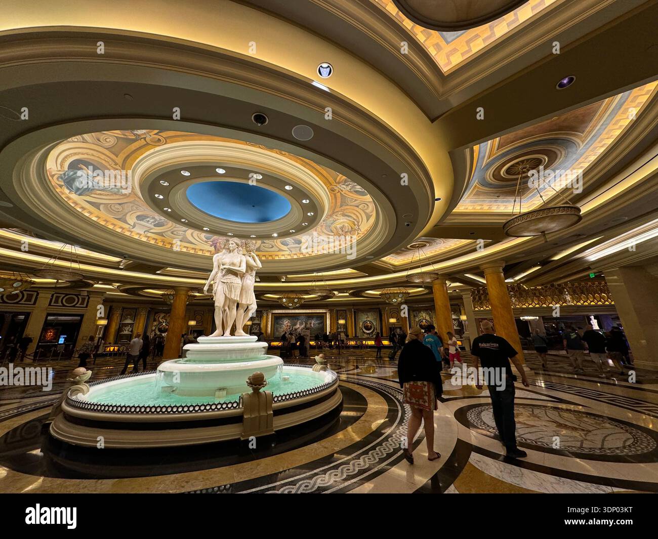 Grand interior hall with classical statue fountain inside Caesars Palace resort, Las Vegas, Nevada, USA. - Smartphone Captured Stock Image