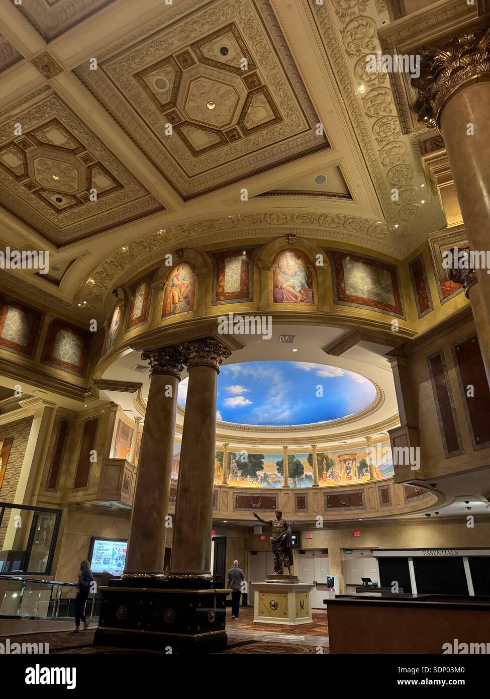 Grand Roman themed interior hall with classical columns, ceiling murals and statue inside Caesars Palace resort, Las Vegas, Nevada, USA. - Smartphone Captured Stock Image