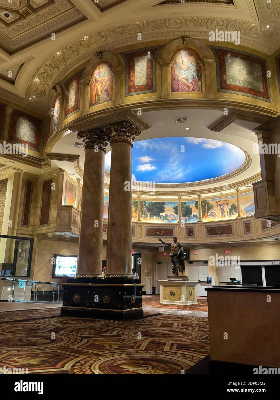 Grand Roman themed interior hall with classical columns, ceiling murals and statue inside Caesars Palace resort, Las Vegas, Nevada, USA. - Smartphone Captured Stock Image