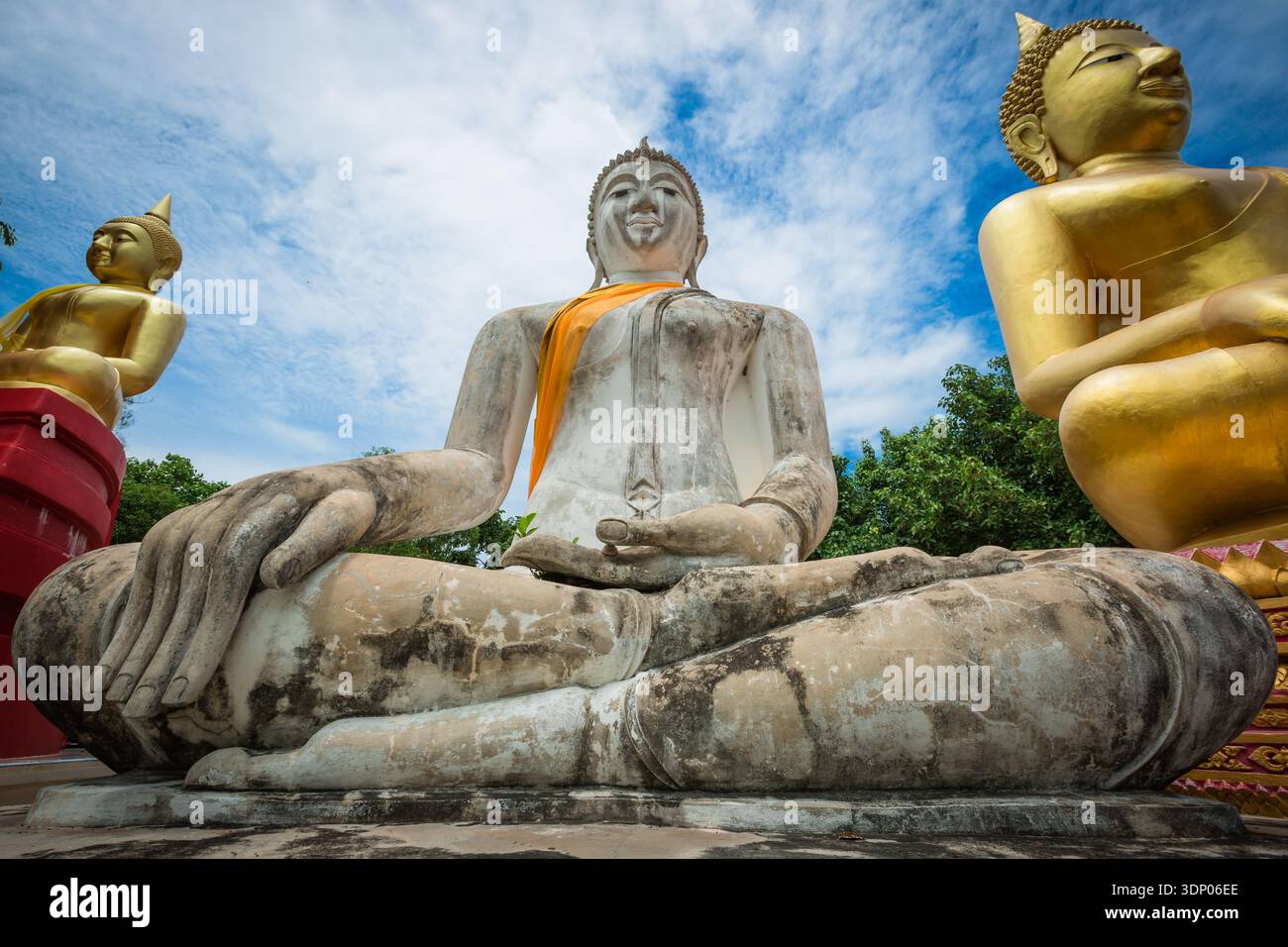 Cement buddha statue under blue sky and clouds background Stock Photo ...