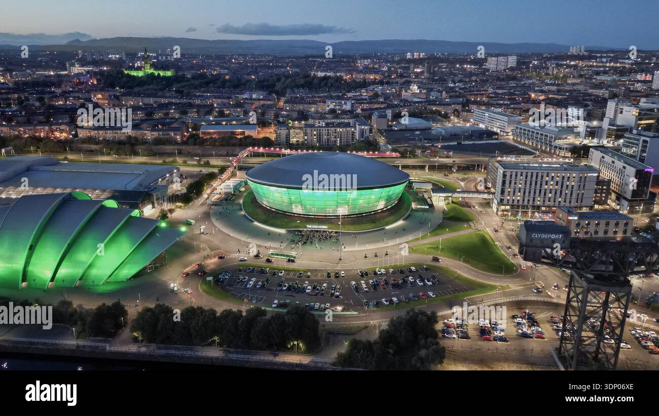 Aerial dusk view of the SSE Hydro, SEC Armadillo and Finnieston Crane on the River Clyde in Glasgow, Scotland, United Kingdom. Stock Photo