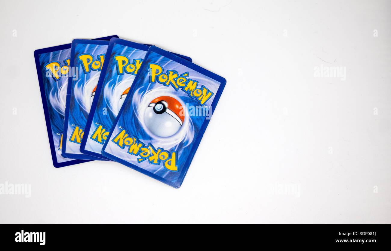 Stack of Pokmon trading cards on white background, collectible game cards  Stock Photo - Alamy