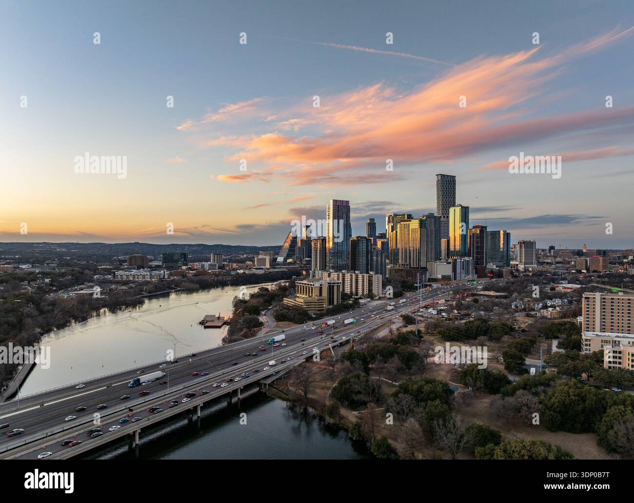 Aerial drone view of sunset over the dramatic skyline of Austin Texas ...