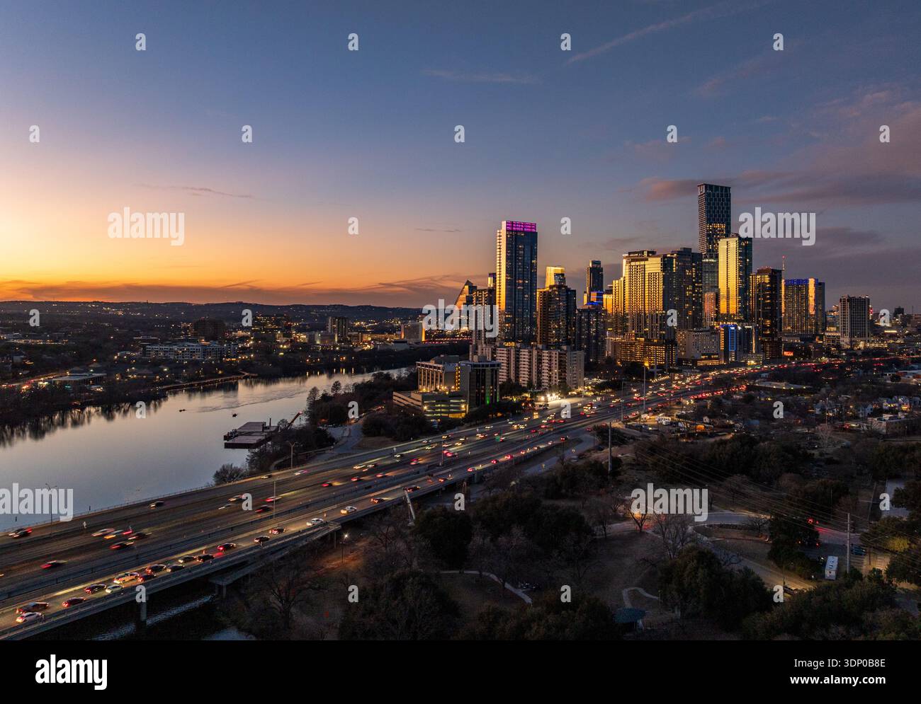 Aerial drone view of the dramatic skyline of Austin Texas at night in ...
