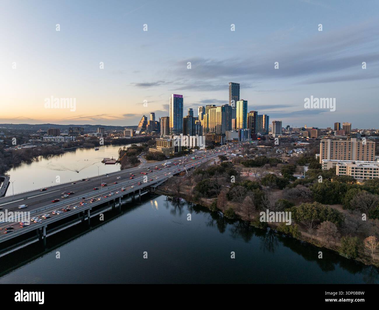 Aerial drone view of sunset over the dramatic skyline of Austin Texas ...