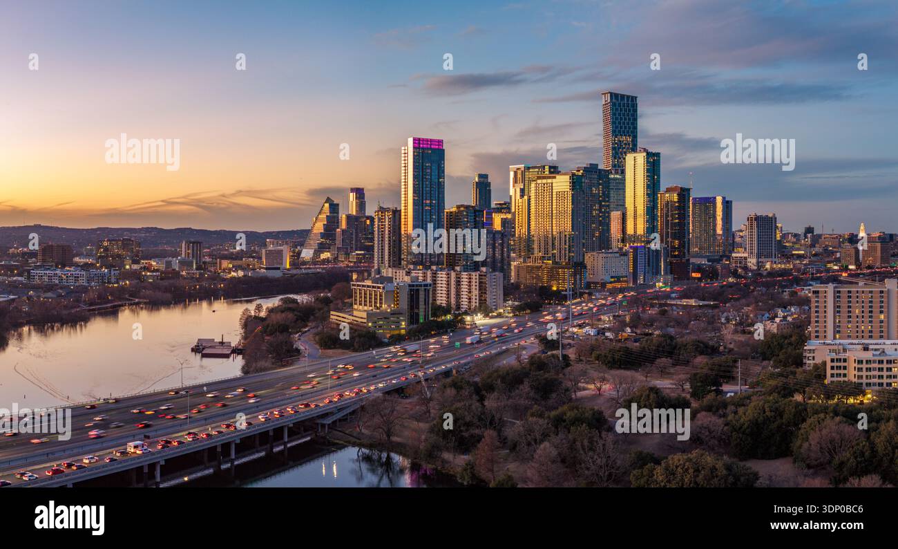 Aerial drone view of sunset over the dramatic skyline of Austin Texas ...