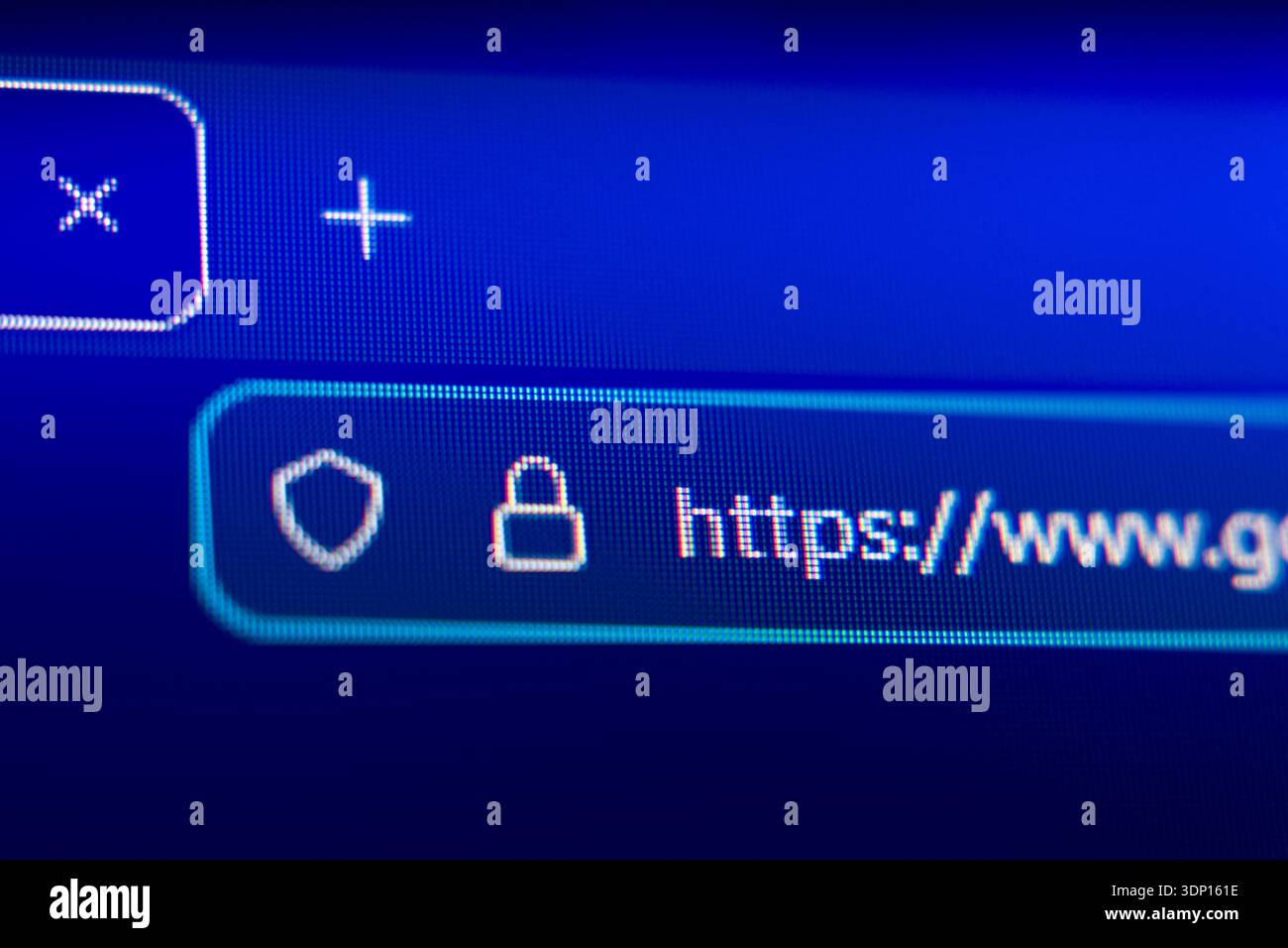 Close-up of a secure web browser address bar with HTTPS protocol, padlock icon, and shield symbol, representing internet security, data privacy, and e Stock Photo