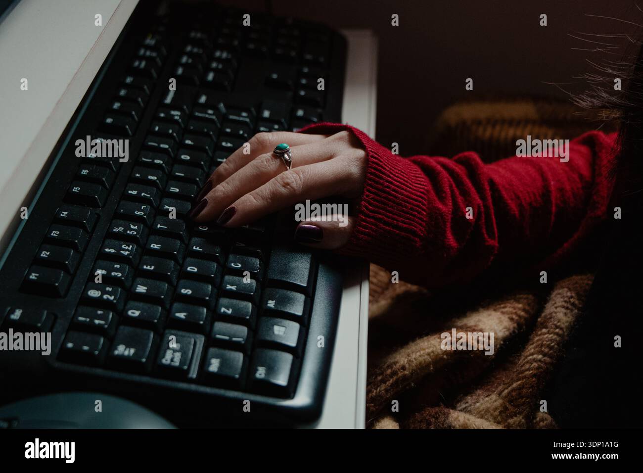 Woman Typing on Computer Keyboard Stock Photo