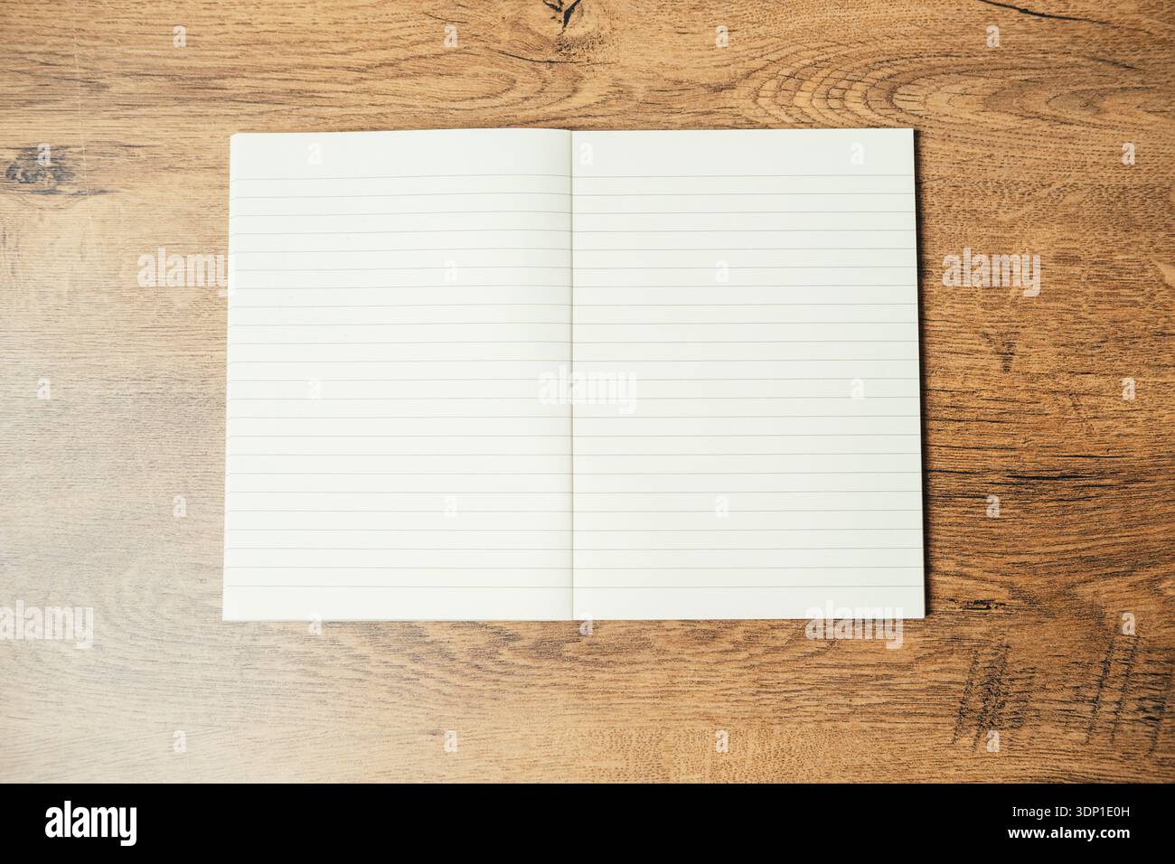 Plain Journal Invites Reflection. Empty Notebook With Lined Pages Resting On Wooden Table Surface Stock Photo