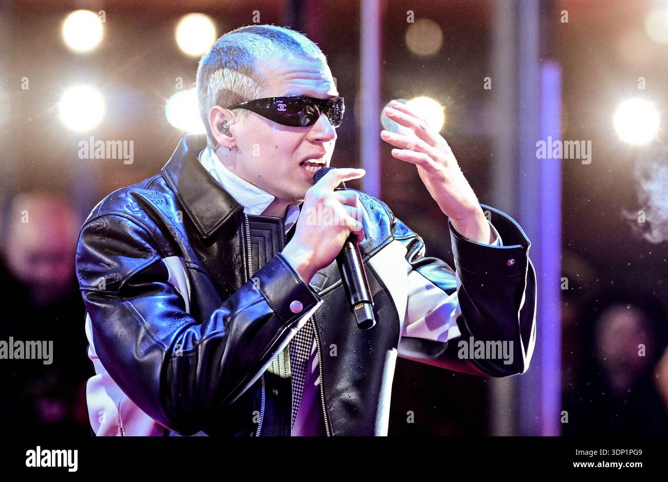 12 February 2026, Berlin: Soho Bani, German rapper, performs on the red ...