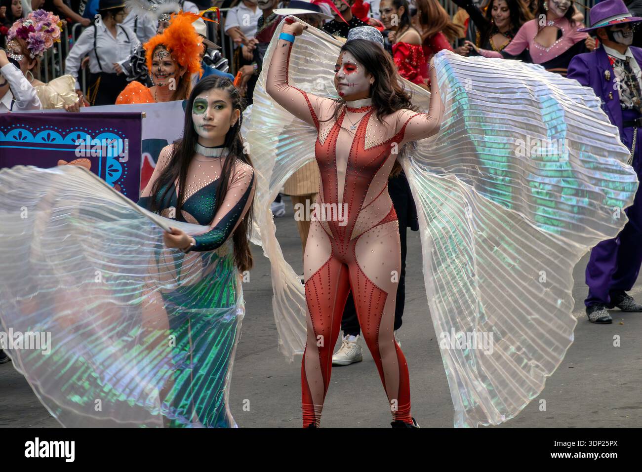 People parade on the street on Day of the Dead in Mexico City, Mexico Stock Photo