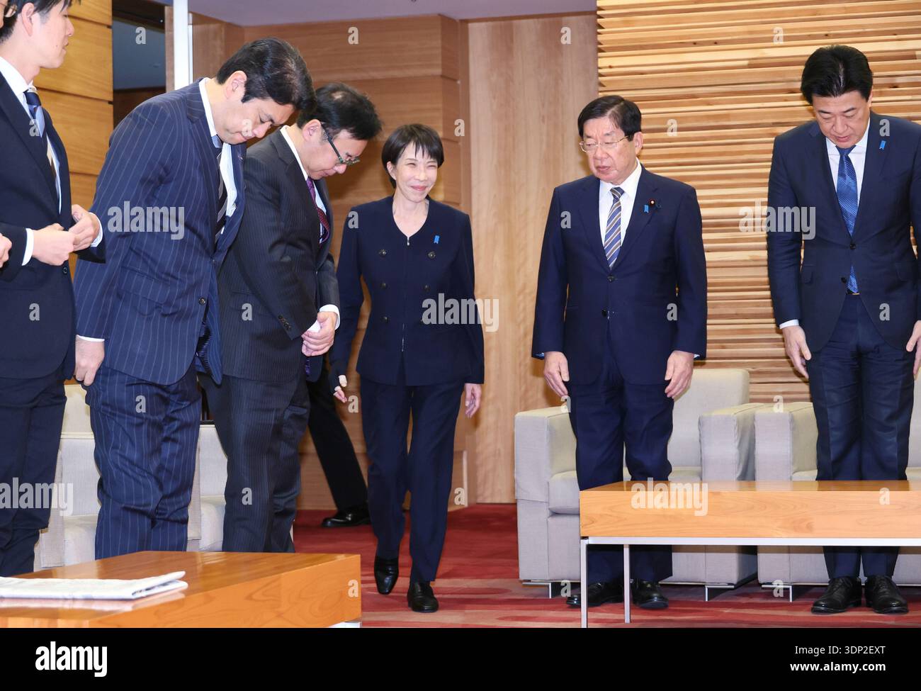 Japanese Prime Minister Sanae Takaichi (C) attends a cabinet meeting at ...