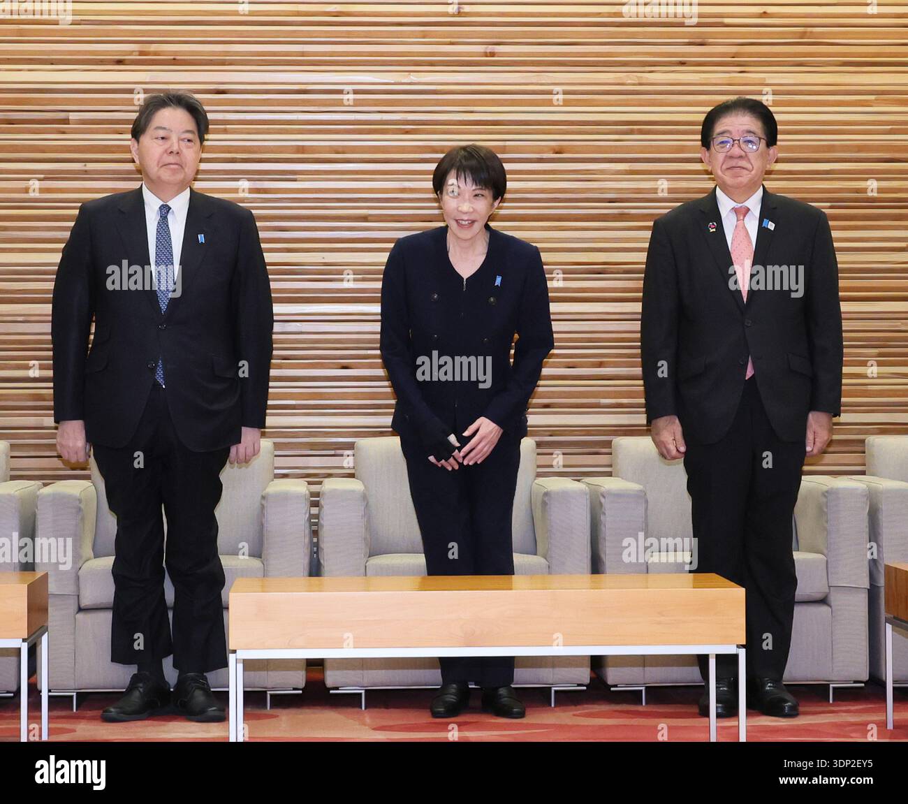 Japanese Prime Minister Sanae Takaichi (C) attends a cabinet meeting at ...