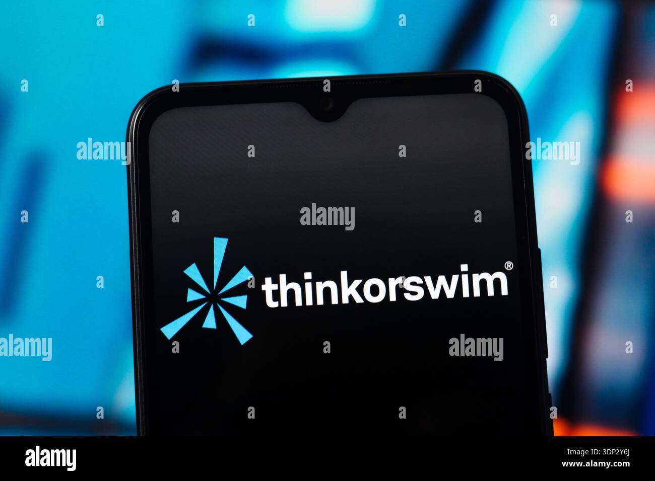 In this photo illustration, the Thinkorswim logo is seen displayed on a ...