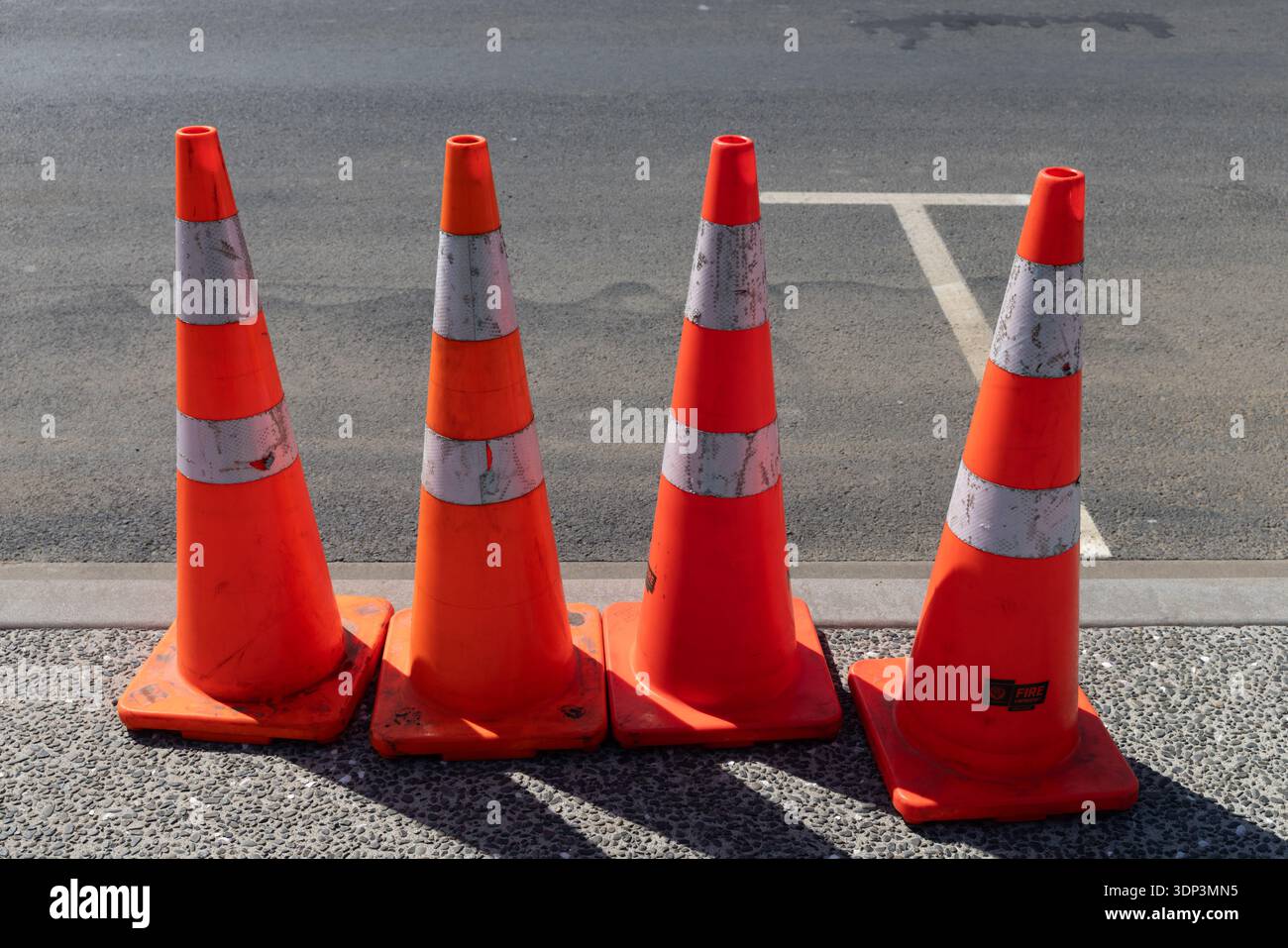 Orange traffic cones hi-res stock photography and images - Alamy