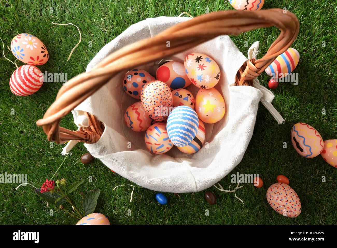 Basket of Colorful Easter Eggs Top View Stock Photo