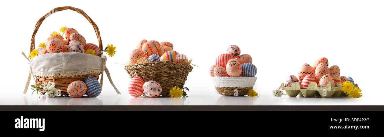 Set of colorful Easter Eggs in Rustic Baskets Stock Photo