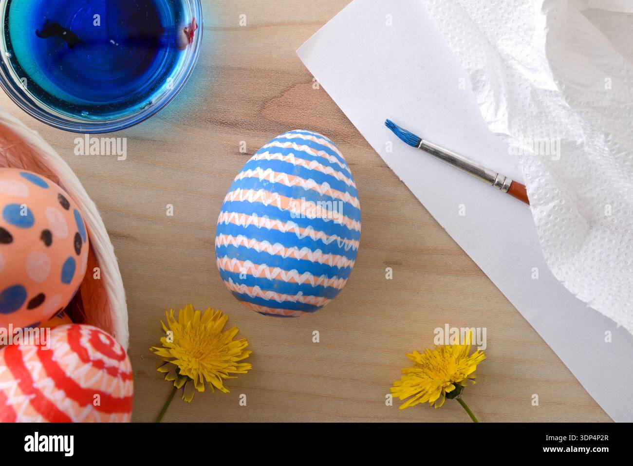 Hand-Painted Easter Eggs with Dye and Flowers Stock Photo