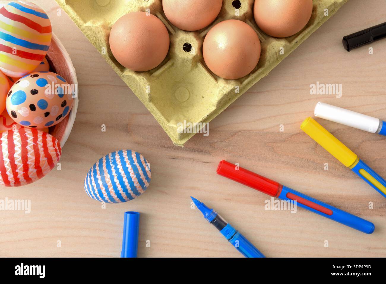 Top View Easter Eggs and Painting Supplies Stock Photo