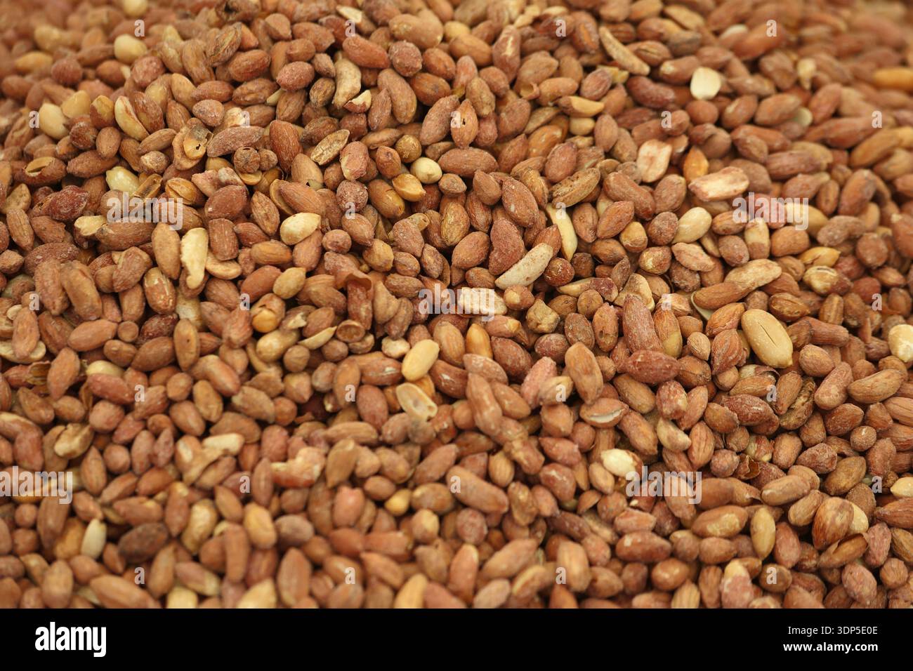 close up of roasted and salted peanuts with skin Stock Photo