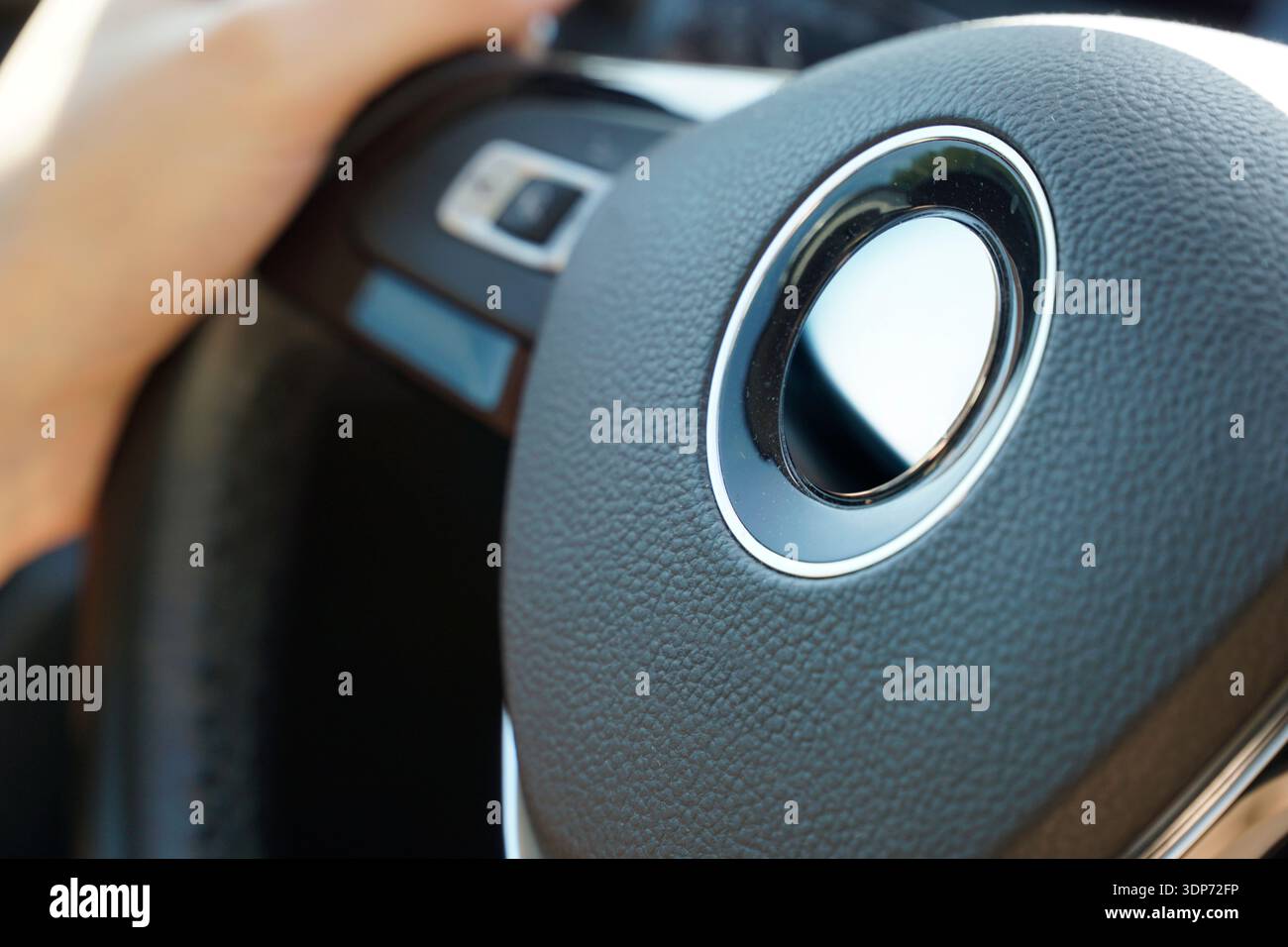 Man Driving Car With Hands On Steering Wheel Stock Photo
