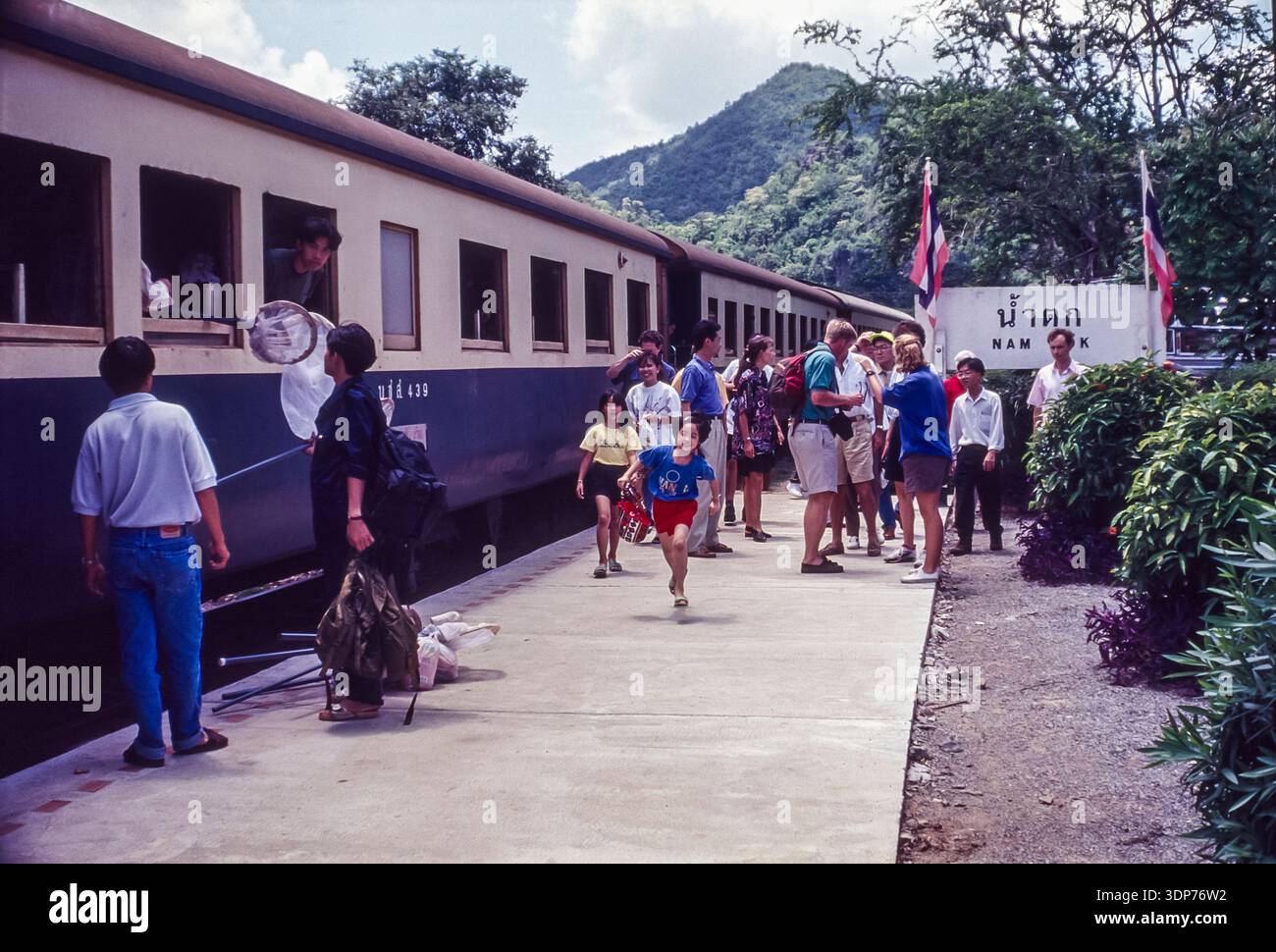 Tourists congregate at Nam Tok railway station en-route to visit Hell ...