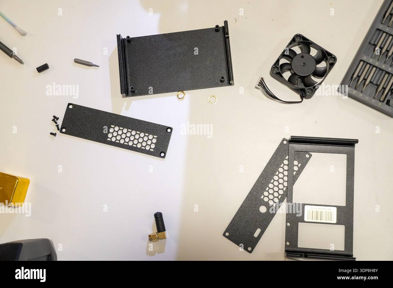Disassembled computer parts on a white background. Close-up. Stock Photo